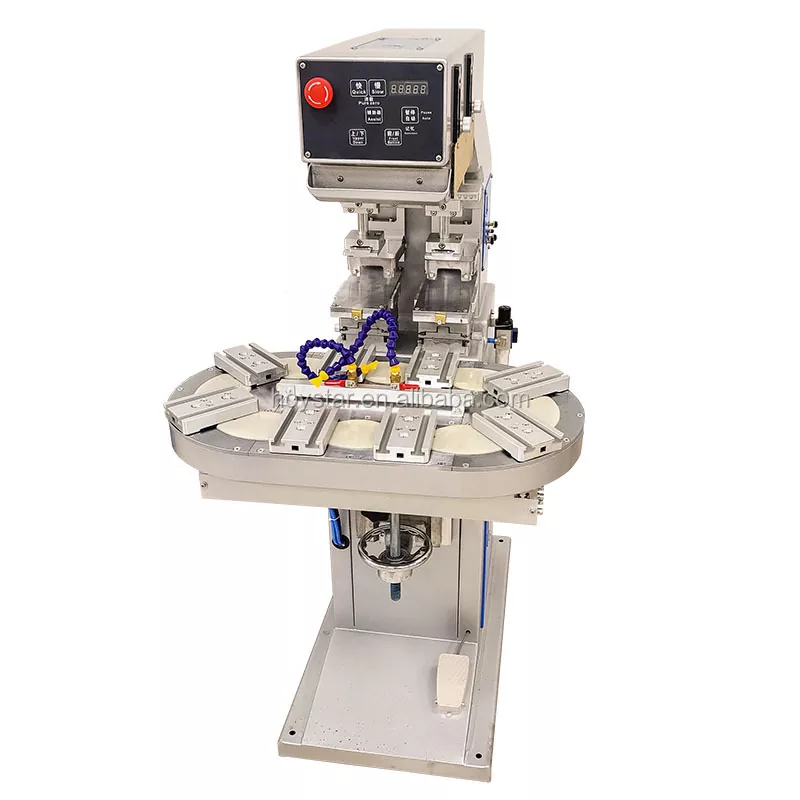 Машина за печатење со ротирачки подлоги за маса во две бои